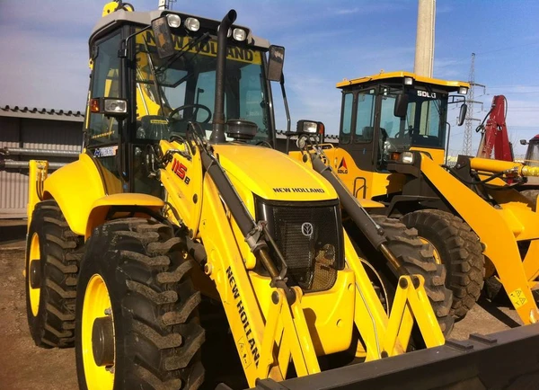 Фото Экскаватор-погрузчик New Holland B115B