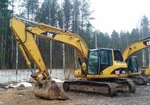 фото Экскаватор гусеничный Caterpillar 319C LN