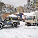 Вытащить легковую машину или грузовик из снега Новосибирск