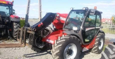 Фото Телескопический погрузчик Manitou MLT 634 б/у из Европы