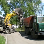 фото Вывоз строительного  и бытового мусора самосвалами КАМАЗ. Погрузка