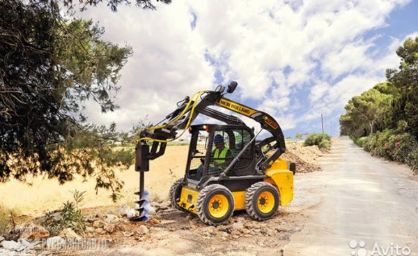 Фото Мини-погрузчик колесный New Holland L218