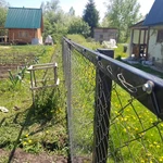 Фото №6  Заборы металлические и деревянные.