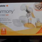 Молокоотсос Medela Хармони ручной с соской.