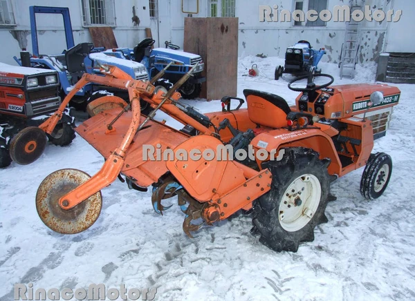 Фото Японский минитрактор Kubota B1402E