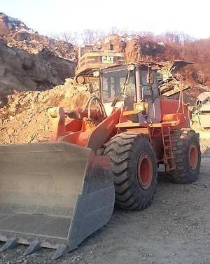 Фото Фронтальный погрузчик Hitachi LX230