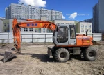 фото Колесный экскаватор Hitachi 135