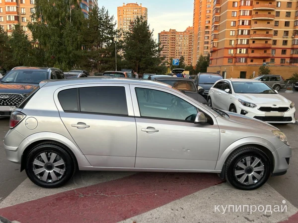 Фото Opel Astra, 2010