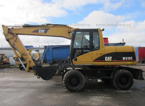 Фото Колесный экскаватор CAT 315, 17 т