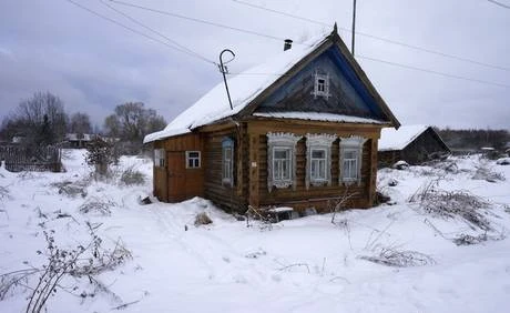 Фото Небольшой бревенчатый дом