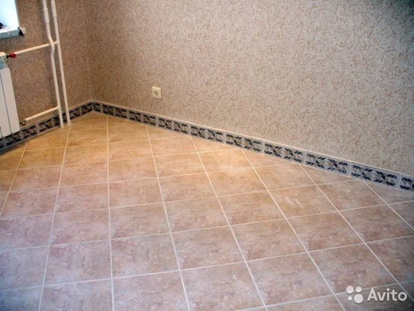 Фото Плиточник