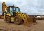 фото Экскаватор-погрузчик Komatsu 93S