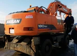 фото Экскаватор колесный Doosan Solar 180W-V 2012г