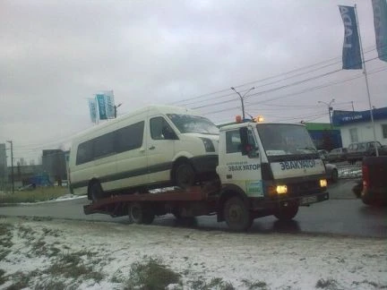 Фото Услуги эвакуатора по Арх. обл