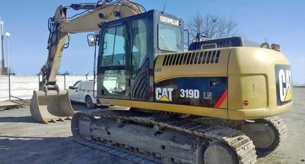 Фото Аренда услуги экскаватора Caterpillar 319 (1 м куб)