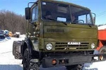 фото Седельный тягач КамАЗ-4310 с бортовым полуприцепом.