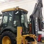 Услуги Экскаватора-погрузчика John Deere 325k