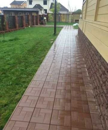 Фото Укладка брусчатки - тротуарной плитки-бордюра