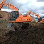 Экскаватор Doosan (Корея). Гидромолот