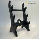 фото Резная подставка под коллекционные ножи в черном  лаке