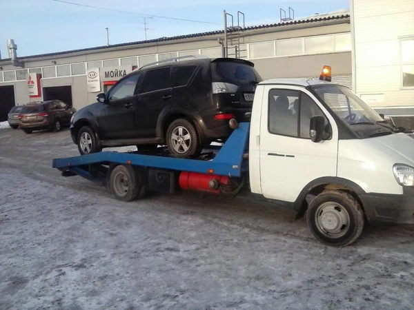 Фото Эвакуатор, буксировка авто техпомощь на дороге