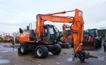 фото Hitachi ZX160W -колесный экскаватор