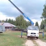 Фото №4 Сборка срубов манипулятором с клещевыми захватами