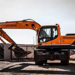 Экскаваторы колёсные CAT hyundai doosan