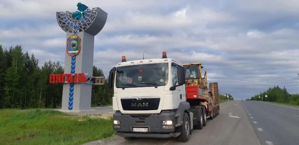 Фото Услуги трала МАН 6х4