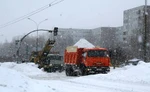 фото Механизированная уборка снега. Вывоз снега