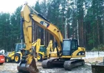 фото Экскаватор гусеничный Caterpillar 320DL 2009 года