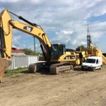 Услуги / Аренда гусеничного Экскаватора Cat 330