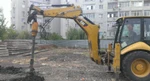 фото Аренда ямобура на основе экскаватора JCB 3CX