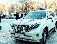 Фото Авто на свадьбу новый крузак и кадил эскалейд