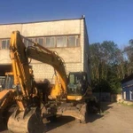 Услуги полноповоротного колесного экскаватора JCB