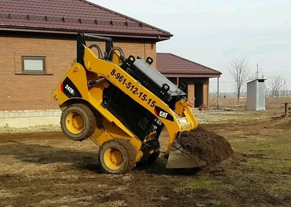Фото Минипогрузчик (Бобкат Cat Caterpillar bobcat).