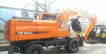 фото Колесный экскаватор Doosan DX210W