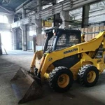 Минипогрузчик Бобкат. Komatsu