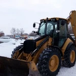 Экскаватор-погрузчик в аренду ЗАО ЮЗАО Москвы.