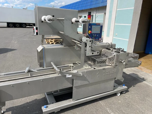 Фото упаковочный автомат флоу пак Rapid 9000.