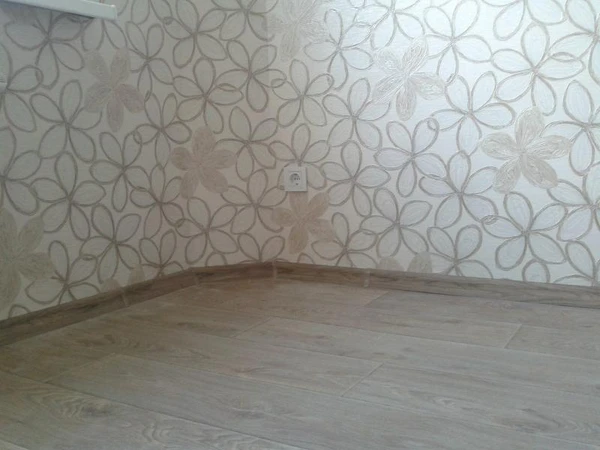 Фото Укладка ламината, линолеума и ковровых покрытий.