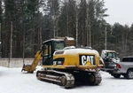 фото Экскаватор гусеничный Caterpillar 319DLN