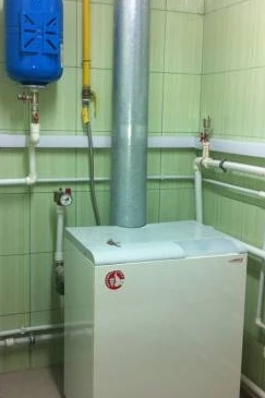 Фото Газовый котёл колонка ремонт