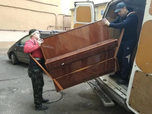 Фото перевозка пианино .