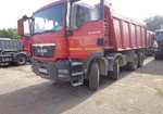 фото Самосвал MAN TGS 41.390 8x4 BB-WW