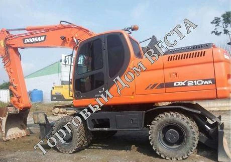 Фото Экскаватор Doosan DX 210 w, 2012 год