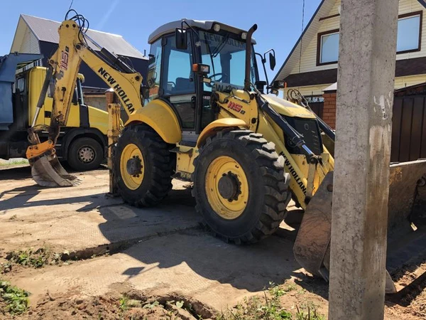 Фото Экскаватор-погрузчик New Holland b115b