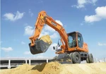 фото Экскаватор колесный Doosan DX 140W