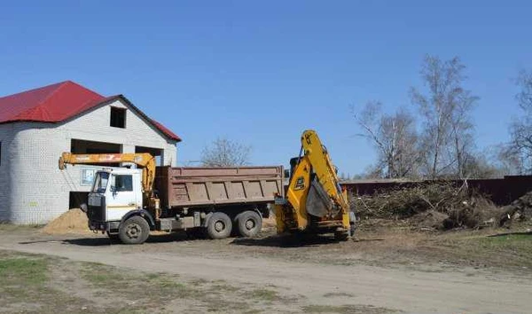 Фото Услуги экскаватора- погрузчика