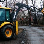 Аренда экскаватора погрузчика с гидромолотом